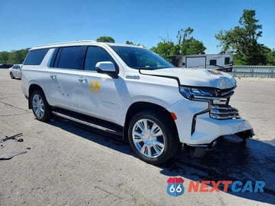 Czwarte zdjęcie samochodu z boku: 2024 CHEVROLET SUBURBAN K1500 HIGH COUNTRY VIN:1GNSKGKL1RR396572 - miniatura