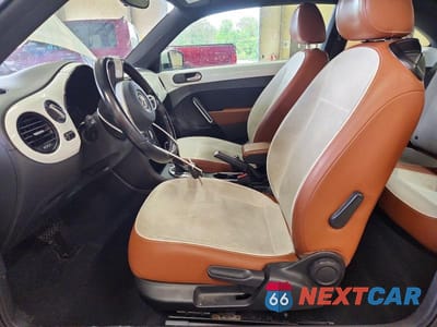 Zdjęcie 7 z 12 samochodu: 2017 VOLKSWAGEN BEETLE 1.8T VIN:3VWF17AT5HM626948 - miniatura