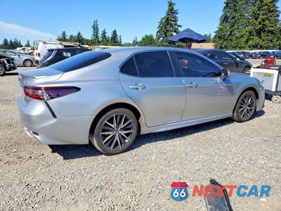 Trzecie zdjęcie samochodu z tyłu: 2023 TOYOTA CAMRY HYBRID SE VIN:4T1G31AK3PU615670 - miniatura