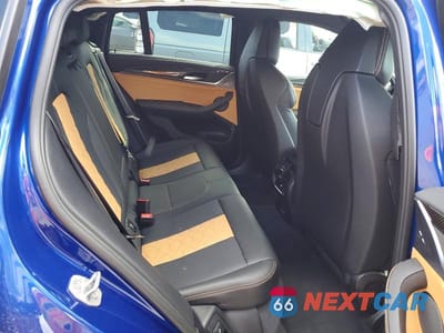 Zdjęcie 11 z 13 samochodu: 2022 BMW X4 M VIN:5YM23EC00N9N37115 - miniatura