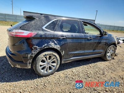 Trzecie zdjęcie samochodu z tyłu: 2019 FORD EDGE TITANIUM VIN:2FMPK4K93KBC22797 - miniatura
