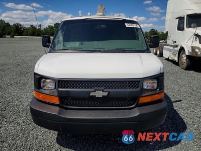 Piąte zdjęcie samochodu w środku: 2014 CHEVROLET EXPRESS 3500 CARGO DELIVERY VAN VIN:1GCZGUCB6E1208358 - miniatura