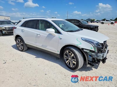 Czwarte zdjęcie samochodu z boku: 2024 CADILLAC XT5 PREMIUM LUXURY VIN:1GYKNDRS1RZ748622 - miniatura