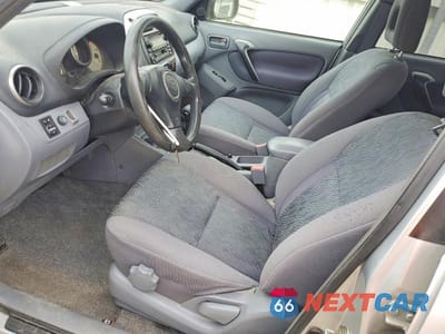 Zdjęcie 7 z 13 samochodu: 2002 TOYOTA RAV4 BASE VIN:JTEGH20V120056736 - miniatura