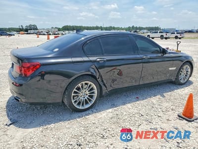 Trzecie zdjęcie samochodu z tyłu: 2015 BMW 740 LI VIN:WBAYE4C5XFD947113 - miniatura