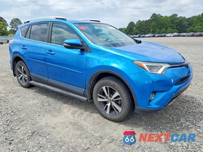 Czwarte zdjęcie samochodu z boku: 2016 TOYOTA RAV4 XLE VIN:JTMRFREV8GJ083227 - miniatura