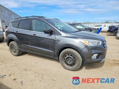 Czwarte zdjęcie samochodu z boku: 2017 FORD ESCAPE SE VIN:1FMCU9G93HUA41765 - miniatura