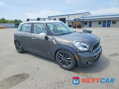Czwarte zdjęcie samochodu z boku: 2013 MINI COOPER S COUNTRYMAN VIN:WMWZC5C52DWP32360 - miniatura
