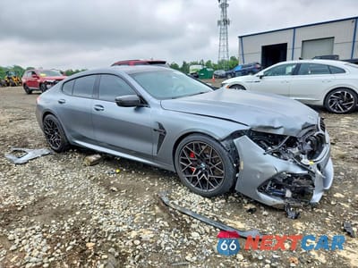 Czwarte zdjęcie samochodu z boku: 2022 BMW M8 VIN:WBSGV0C03NCJ88216 - miniatura