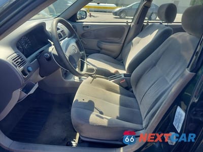 Zdjęcie 7 z 12 samochodu: 2002 TOYOTA COROLLA CE VIN:2T1BR12EX2C565233 - miniatura