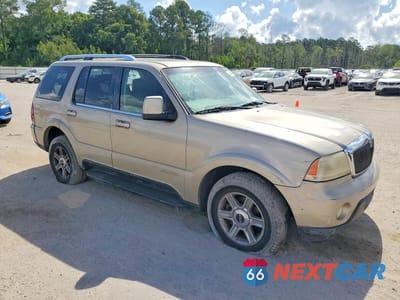 Czwarte zdjęcie samochodu z boku: 2004 LINCOLN AVIATOR VIN:5LMEU88H44ZJ53137 - miniatura