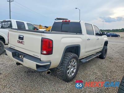 Czwarte zdjęcie samochodu z boku: 2014 GMC SIERRA K1500 DENALI VIN:3GTU2WEJ2EG548164 - miniatura