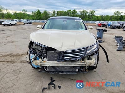 Piąte zdjęcie samochodu w środku: 2016 LINCOLN MKX RESERVE VIN:2LMTJ8LR5GBL87608 - miniatura