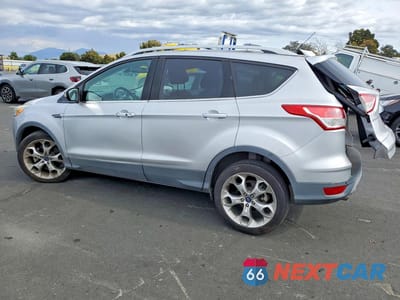 Trzecie zdjęcie samochodu z tyłu: 2014 FORD ESCAPE TITANIUM VIN:1FMCU0J91EUA77938 - miniatura