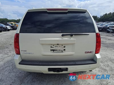 Zdjęcie 6 z 13 samochodu: 2010 GMC YUKON SLT VIN:1GKUCCE04AR288352 - miniatura