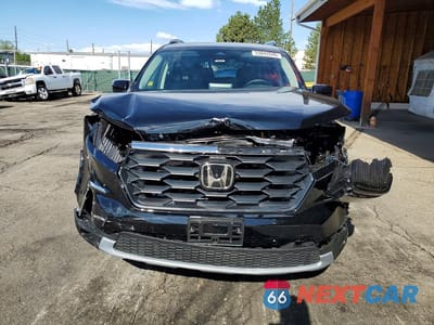 Piąte zdjęcie samochodu w środku: 2025 HONDA PILOT EXL VIN:5FNYG1H4XSB104009 - miniatura