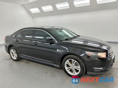 Czwarte zdjęcie samochodu z boku: 2017 FORD TAURUS SEL VIN:1FAHP2H82HG126292 - miniatura
