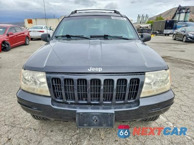 Piąte zdjęcie samochodu w środku: 1999 JEEP GRAND CHEROKEE LIMITED VIN:1J4G268S3XC537241 - miniatura