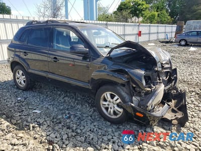 Czwarte zdjęcie samochodu z boku: 2007 HYUNDAI TUCSON SE VIN:KM8JN72D77U506258 - miniatura