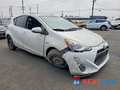 Czwarte zdjęcie samochodu z boku: 2015 TOYOTA PRIUS C TWO VIN:JTDKDTB35F1583173 - miniatura