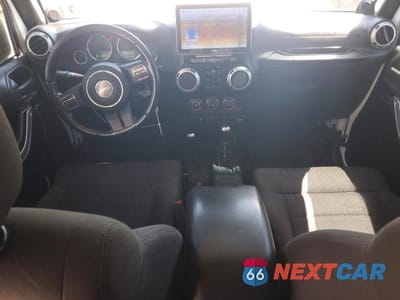Zdjęcie 8 z 13 samochodu: 2011 JEEP WRANGLER UNLIMITED SAHARA VIN:1J4BA5H15BL592815 - miniatura