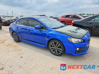 Czwarte zdjęcie samochodu z boku: 2016 SUBARU WRX LIMITED VIN:JF1VA1J65G9822638 - miniatura