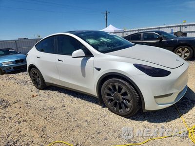 Czwarte zdjęcie samochodu z boku: 2020 TESLA MODEL Y VIN:5YJYGDEE7LF040611 - miniatura