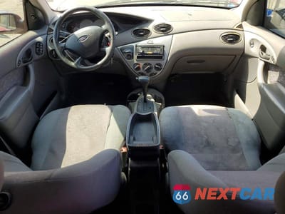 Zdjęcie 8 z 12 samochodu: 2003 FORD FOCUS ZX5 VIN:3FAFP37Z13R191398 - miniatura