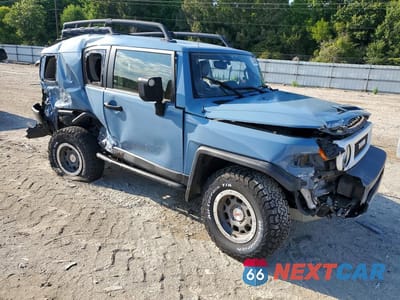 Czwarte zdjęcie samochodu z boku: 2014 TOYOTA FJ CRUISER BASE VIN:JTEBU4BFXEK192427 - miniatura