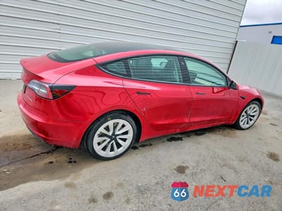 Trzecie zdjęcie samochodu z tyłu: 2022 TESLA MODEL 3 VIN:5YJ3E1EB6NF286833 - miniatura