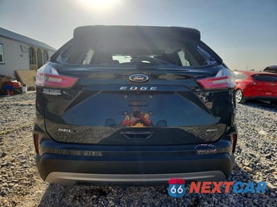 Zdjęcie 6 z 13 samochodu: 2021 FORD EDGE SEL VIN:2FMPK4J96MBA57073 - miniatura