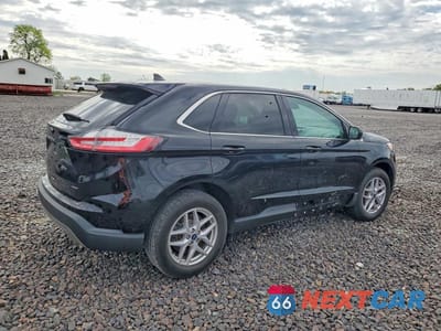 Trzecie zdjęcie samochodu z tyłu: 2022 FORD EDGE SEL VIN:2FMPK4J99NBA77769 - miniatura