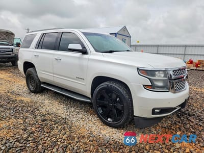 Czwarte zdjęcie samochodu z boku: 2018 CHEVROLET TAHOE K1500 LT VIN:1GNSKBKC6JR179574 - miniatura