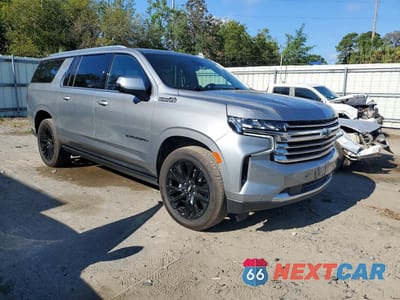 Czwarte zdjęcie samochodu z boku: 2023 CHEVROLET SUBURBAN K1500 HIGH COUNTRY VIN:1GNSKGKL8PR526022 - miniatura