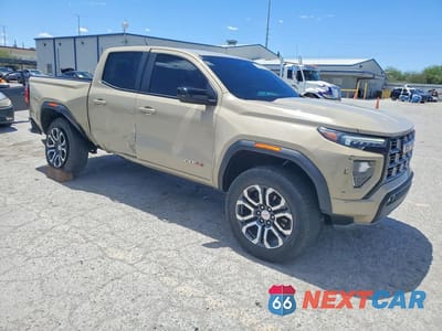 Czwarte zdjęcie samochodu z boku: 2024 GMC CANYON AT4 VIN:1GTP6DEK7R1160754 - miniatura