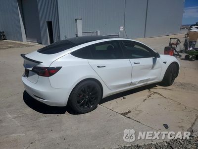 Trzecie zdjęcie samochodu z tyłu: 2018 TESLA MODEL 3 VIN:5YJ3E1EB4JF098029 - miniatura