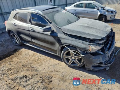 Czwarte zdjęcie samochodu z boku: 2015 MERCEDES-BENZ GLA 250 4MATIC VIN:WDCTG4GBXFJ086874 - miniatura
