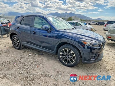 Czwarte zdjęcie samochodu z boku: 2016 MAZDA CX-5 GT VIN:JM3KE4DY1G0725366 - miniatura