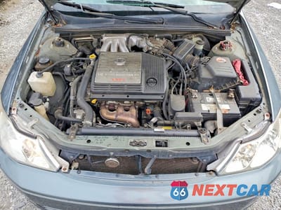 Zdjęcie 11 z 12 samochodu: 2001 TOYOTA AVALON XLS VIN:4T1BF28B11U132103 - miniatura