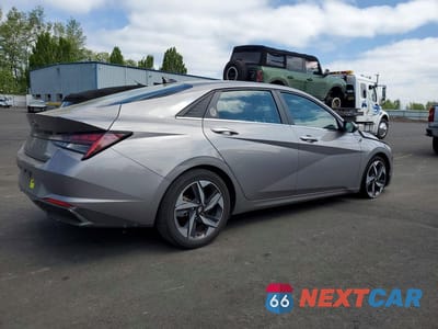 Trzecie zdjęcie samochodu z tyłu: 2022 HYUNDAI ELANTRA LIMITED VIN:KMHLN4AJ2NU016077 - miniatura