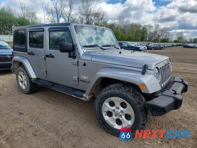 Czwarte zdjęcie samochodu z boku: 2013 JEEP WRANGLER UNLIMITED SAHARA VIN:1C4BJWEG3DL635829 - miniatura