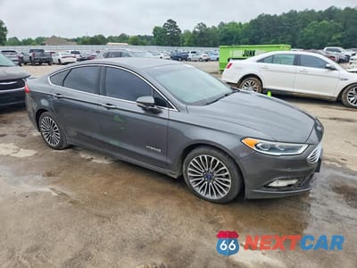 Czwarte zdjęcie samochodu z boku: 2017 FORD FUSION HYBRID TITAN VIN:3FA6P0RU9HR399858 - miniatura