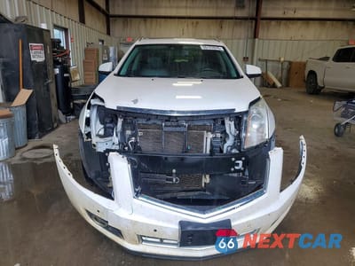 Piąte zdjęcie samochodu w środku: 2015 CADILLAC SRX PERFORMANCE COLLECTION VIN:3GYFNCE39FS586659 - miniatura