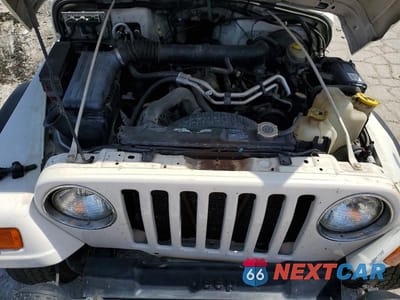 Zdjęcie 12 z 13 samochodu: 2002 JEEP WRANGLER / TJ SPORT VIN:1J4FA49S92P755378 - miniatura