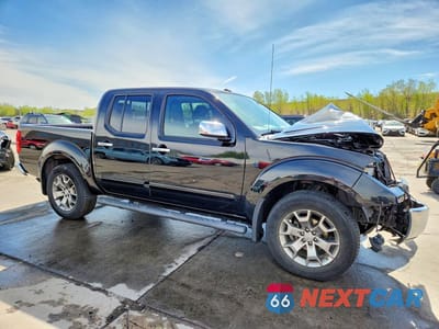 Czwarte zdjęcie samochodu z boku: 2015 NISSAN FRONTIER SL VIN:1N6AD0EV3FN747310 - miniatura