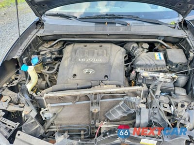 Zdjęcie 12 z 13 samochodu: 2007 HYUNDAI TUCSON SE/LIMITED VIN:KM8JN12D47U543832 - miniatura