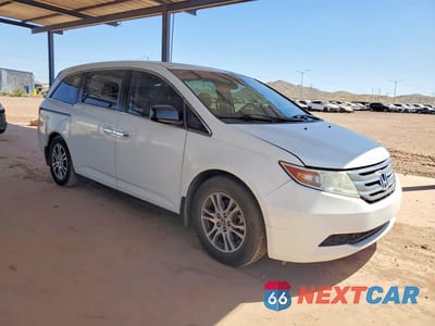 Czwarte zdjęcie samochodu z boku: 2011 HONDA ODYSSEY EXL VIN:5FNRL5H65BB031754 - miniatura