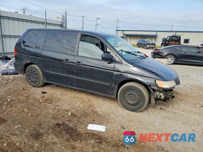 Czwarte zdjęcie samochodu z boku: 2000 HONDA ODYSSEY LX VIN:2HKRL1857YH596386 - miniatura