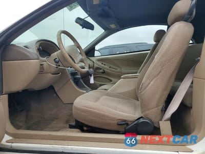 Zdjęcie 7 z 13 samochodu: 1999 FORD MUSTANG VIN:1FAFP4448XF148260 - miniatura