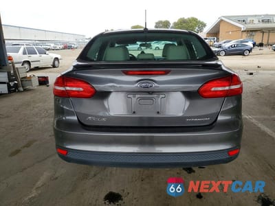 Zdjęcie 6 z 12 samochodu: 2017 FORD FOCUS TITANIUM VIN:1FADP3J20HL288147 - miniatura